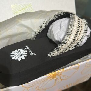 Yellow box flip flops